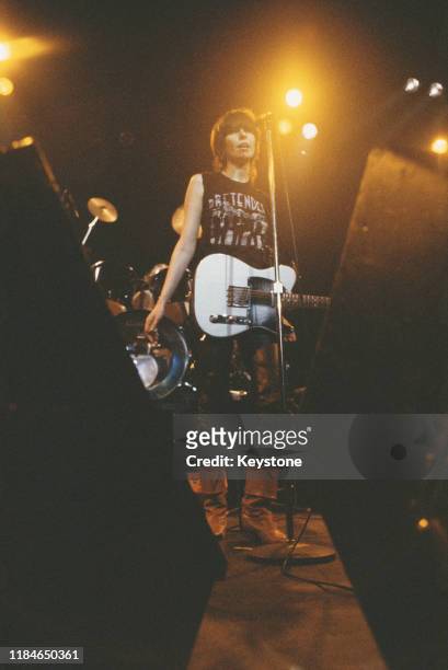 Singer and guitarist Chrissie Hynde of rock band The Pretenders in concert at the Lyceum in London, 14th December 1981.