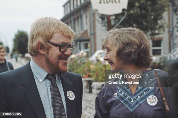 British politician Bill Pitt , the SDP/Liberal candidate in the Croydon North West by-election, out canvassing with SDP politician Shirley Williams,...