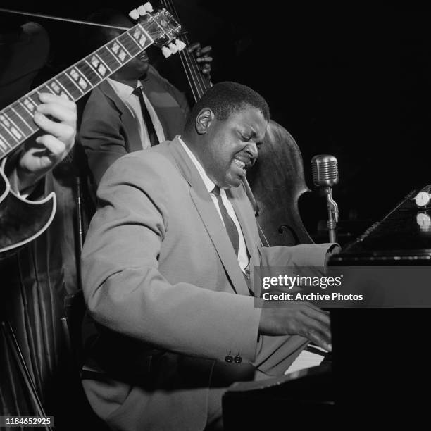 Canadian jazz pianist and composer Oscar Peterson in concert, circa 1955.