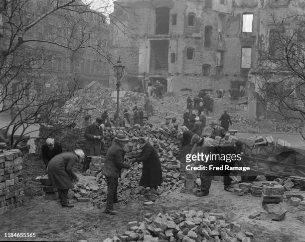 Volunteers clearing away the rubble in Dresden, in the Russian-occupied zone of Germany, after the destruction of World War II, March 1946.