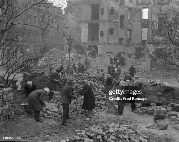 Volunteers clearing away the rubble in Dresden, in the Russian-occupied zone of Germany, after the destruction of World War II, March 1946.