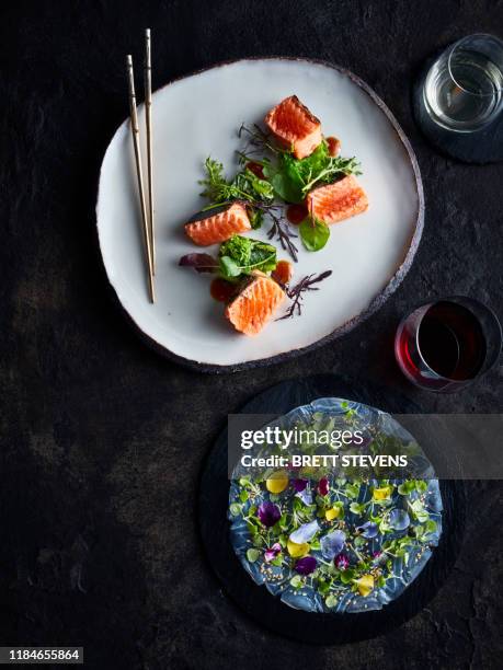 usuzuki saikou salmon robatayaki with yuzu miso and edible flowers - red wine stock pictures, royalty-free photos & images