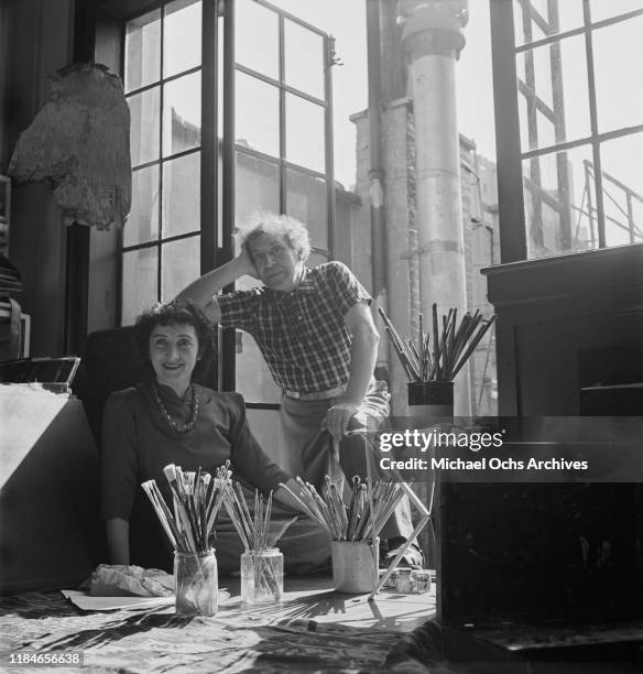 Russian-French artist Marc Chagall in his studio with his wife, writer Bella Rosenfeld , circa 1942.