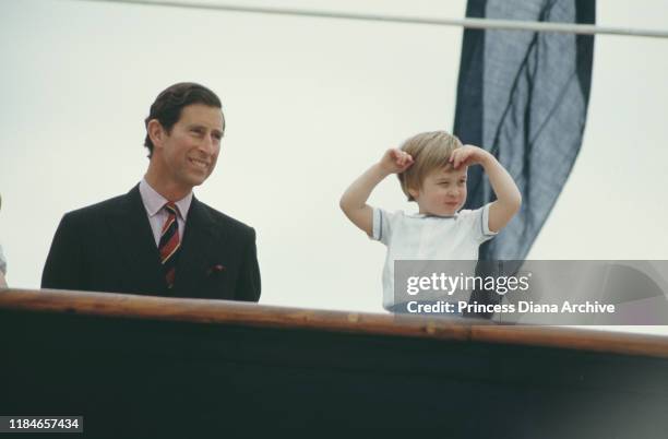 Prince Charles on the royal yacht 'Britannia' with his son Prince William during a visit to Venice, Italy, April 1985.