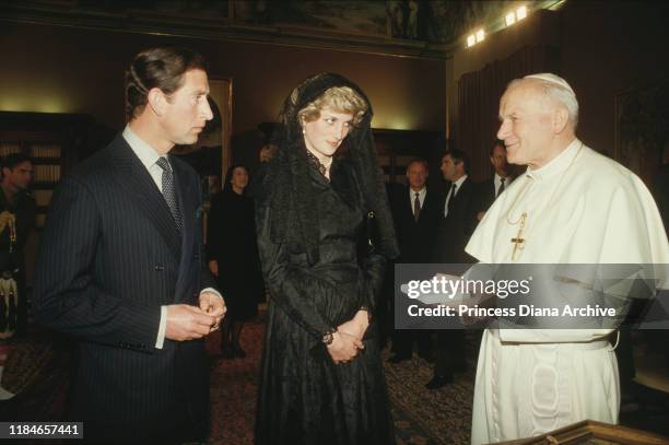 Prince Charles and Diana, Princess of Wales at the Vatican in Rome, Italy, during an audience with Pope John Paul II , April 1985. Diana's black lace...