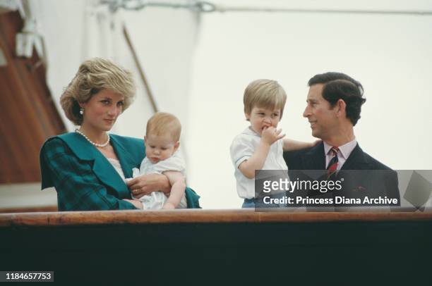 Prince Charles and Diana, Princess of Wales on the royal yacht 'Britannia' with their sons William and Harry during a visit to Venice, Italy, April...