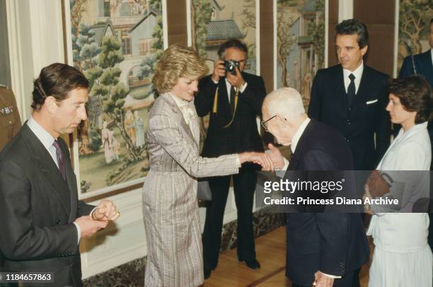 Prince Charles and Diana, Princess of Wales lunch with Italian President Sandro Pertini in Rome, Italy, 27th April 1985.