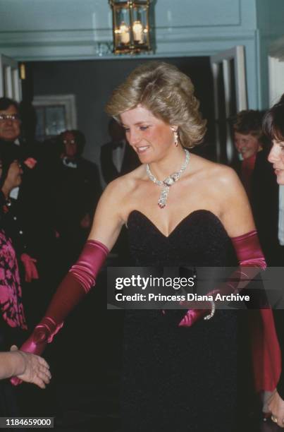 Diana, Princess of Wales attends the Black and Pink Ball at Claridge's Hotel in London, September 1987.