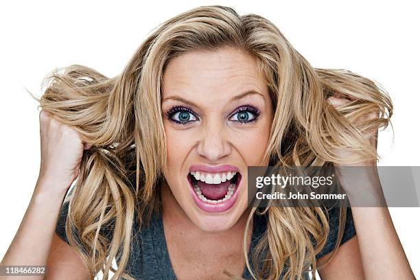 angry woman - pulling hair stock pictures, royalty-free photos & images