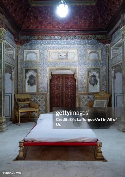 Maharaja's bedroom with gold decorated gold walls and doors inside Junagarh fort, Rajasthan, Bikaner, India on July 25, 2019 in Bikaner, India.