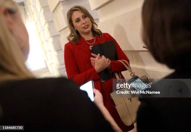 Rep. Katie Hill answers questions from reporters at the U.S. Capitol following her final speech on the floor of the House of Representatives October...