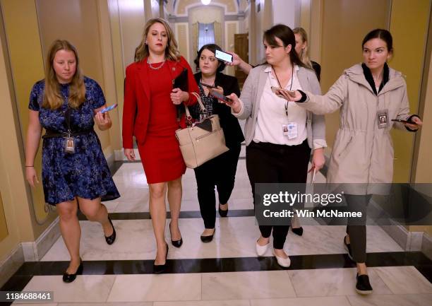 Rep. Katie Hill answers questions from reporters at the U.S. Capitol following her final speech on the floor of the House of Representatives October...