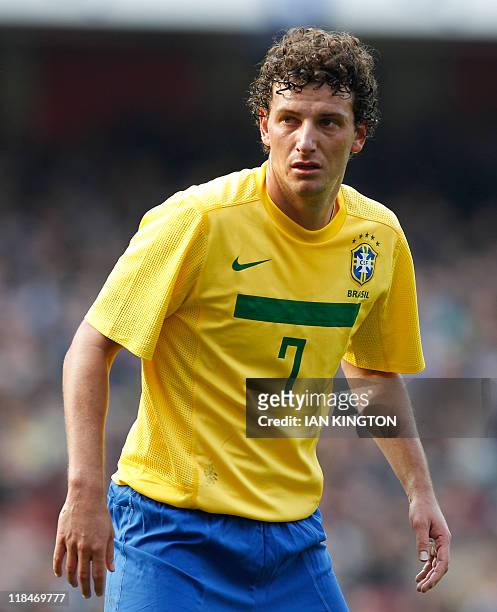 Brazil's Elano gestures during their International friendly football match against Scotland at the Emirates Stadium in London, on March 27, 2011. AFP...
