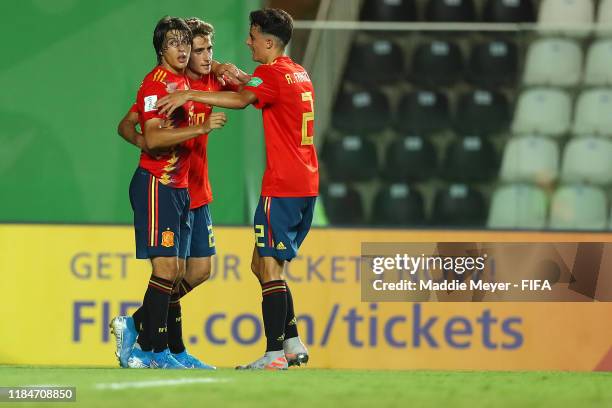 Roberto Navarro of Spain, center, celebrates with Alejandro Frances and Pablo Moreno after scoring a goal during the FIFA U-17 World Cup Brazil 2019...