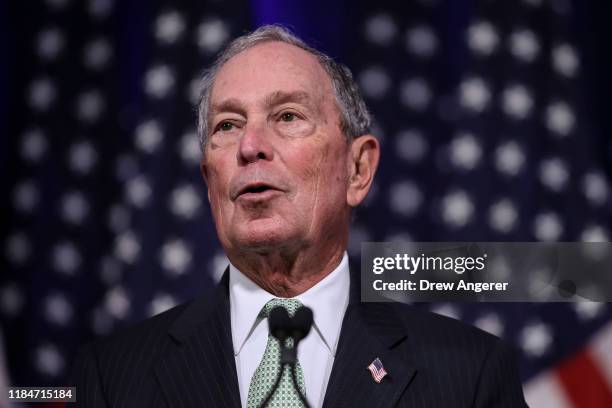 Newly announced Democratic presidential candidate, former New York Mayor Michael Bloomberg speaks during a press conference to discuss his...