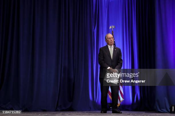 Newly announced Democratic presidential candidate, former New York Mayor Michael Bloomberg prepares for a press conference to discuss his...