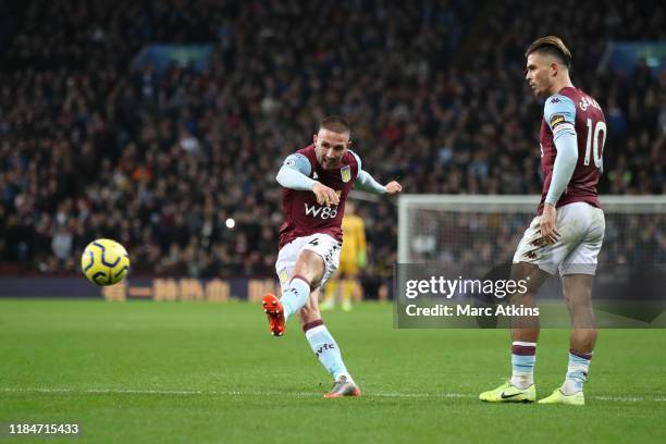 Conor Hourihane of Aston Villa scores the opening goal during the Premier League match between Aston Villa and Newcastle United at Villa Park on...