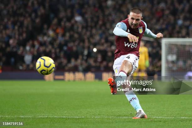 Conor Hourihane of Aston Villa scores the opening goal during the Premier League match between Aston Villa and Newcastle United at Villa Park on...