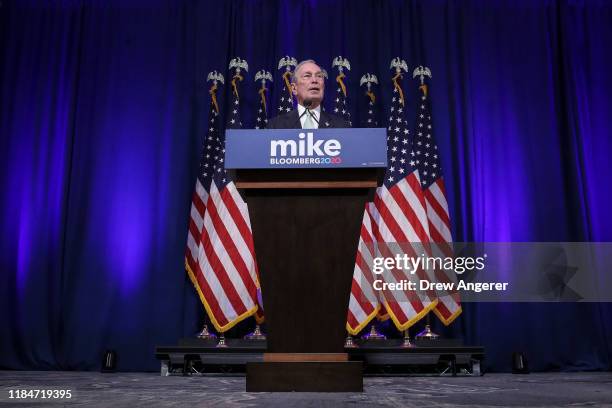 Newly announced Democratic presidential candidate, former New York Mayor Michael Bloomberg speaks during a press conference to discuss his...