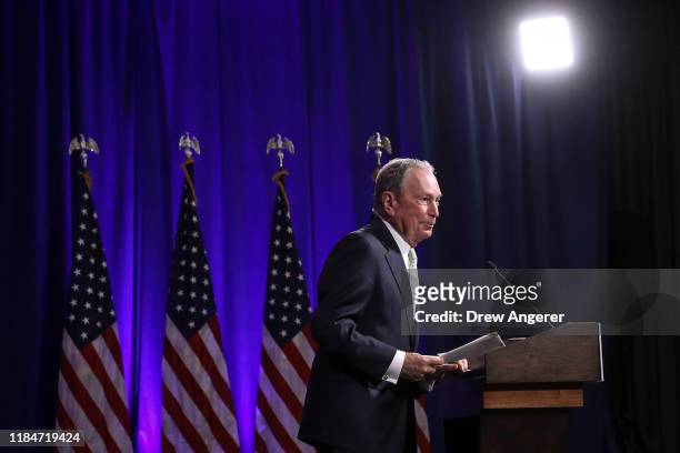 Newly announced Democratic presidential candidate, former New York Mayor Michael Bloomberg speaks during a press conference to discuss his...