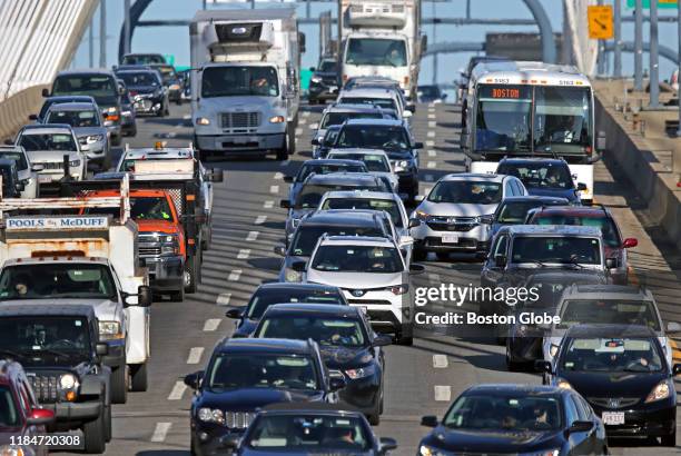 Morning rush hour traffic heads northbound on the Leonard P. Zakim Bunker Hill Memorial Bridge in Boston on Oct. 15, 2019. Bostons current traffic...
