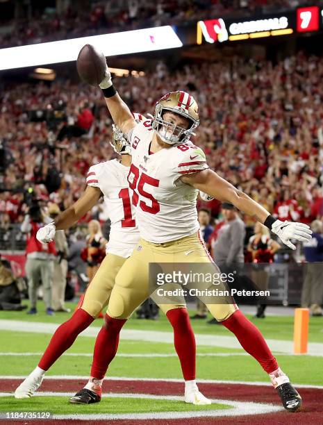 Tight end George Kittle of the San Francisco 49ers celebrates his touchdown in the first quarter over the Arizona Cardinals at State Farm Stadium on...