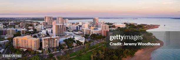 aerial view of darwin at sunset - darwin stockfoto's en -beelden