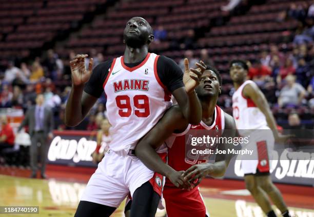 Tacko Fall of the Maine Red Claws blocks out against Nino Johnson of the Memphis Hustle during an NBA G-League game on November 25, 2019 at Landers...