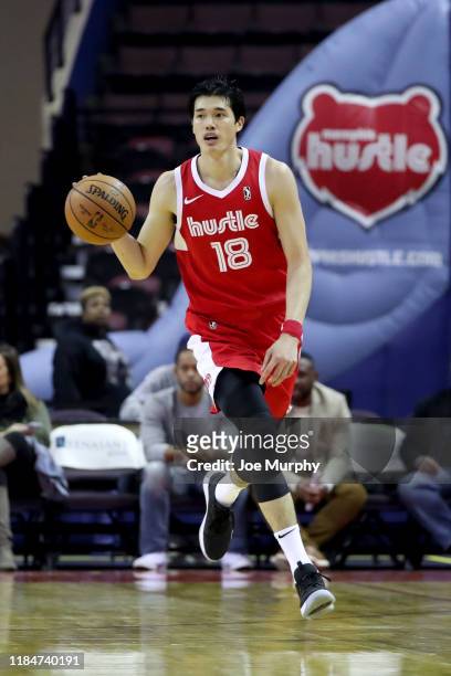 Yuta Watanabe of the Memphis Hustle dribbles the ball up court against the Maine Red Claws during an NBA G-League game on November 25, 2019 at...