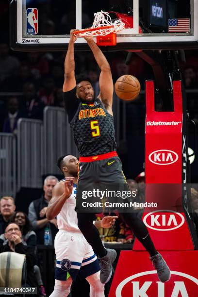 Jabari Parker of the Atlanta Hawks dunks the ball during the first quarter of the game against the Minnesota Timberwolves at State Farm Arena on...