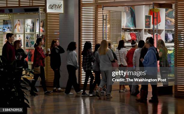 Shoppers line up at the door of the aerie store in Columbia Mall just as it was opening at 6:00am this morning. -The foot traffic at the Columbia...