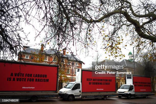 Vans belonging to The Community United against Labour Party anti-Semitism group, Culpa, arrive ahead of the Labour Race and Faith Manifesto launch on...