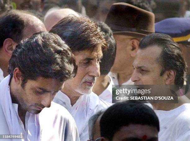 Industralist Anil Ambani offers his condolences to Bollywood star Amitabh Bachchan and his son Abishek Bachchan during the funeral of Amitabh's...