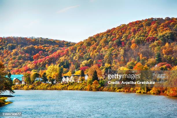 view of beautiful autumn landscape of warren, pennsylvania, usa - pennsylvania stock-fotos und bilder