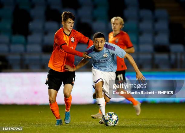 Manchester City's Ian Poveda and Shakhtar Donetsk's Dmytro Kryskiv battle for the ball Manchester City v Shakhtar Donetsk - UEFA Youth League - Group...