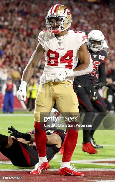 Wide receiver Kendrick Bourne of the San Francisco 49ers celebrates his touchdown in the second quarter over the Arizona Cardinals in the game at...