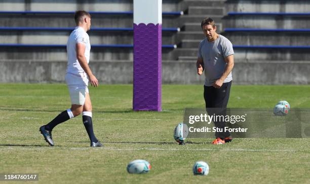 England captain Owen Farrell receives advice from England 2003 hero Jonny Wilkinson during England captains run ahead of the 2019 Rugby World Cup...