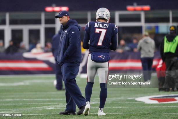 New England Patriots special teams coordinator / wide receivers coach Joe Judge and New England Patriots punter Jake Bailey during warm up before a...