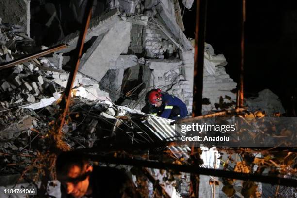 Search and rescue works continue at the scene of a partly collapse building after 6.3-magnitude earthquake hit Albania's Durres city on November 26,...