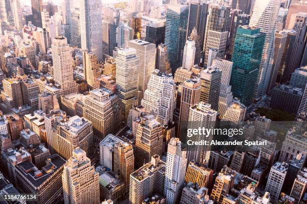 aerial view of skyscrapers in midtown manhattan, new york city, usa - manhattan skyline stock pictures, royalty-free photos & images