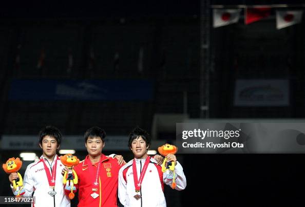 Eriguchi Silver medalist Masashi Eriguchi of Japan, gold medalist Su Bingtian ...