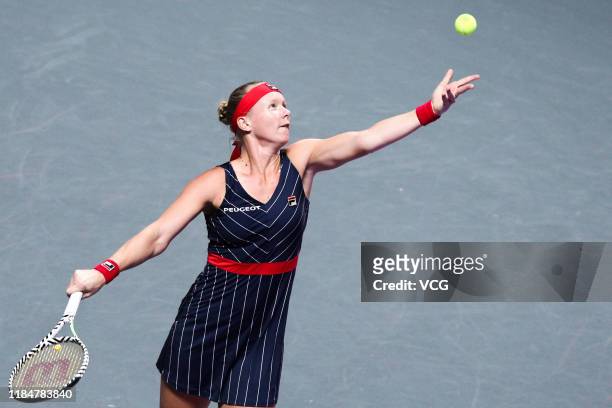 Kiki Bertens of the Netherlands competes in the Women's Singles group match against Belinda Bencic of Switzerland on Day five of the 2019 WTA Finals...
