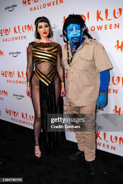 Heather Taras and Daymond John attend Heidi Klum's 20th Annual Halloween Party at Cathédrale on October 31, 2019 in New York City.