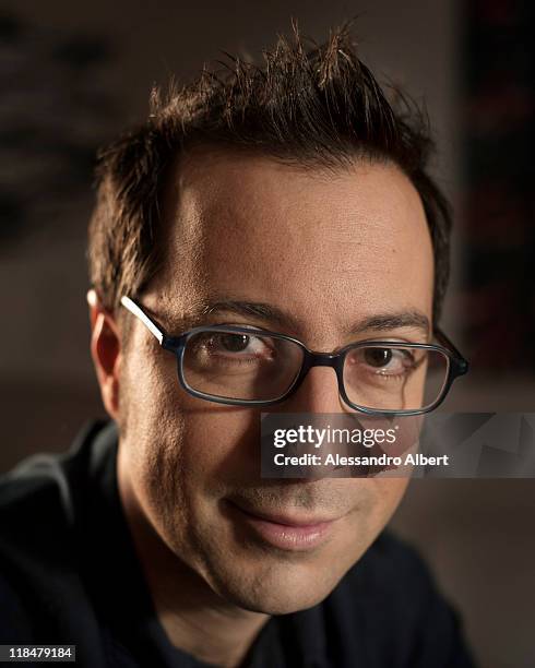 Italian writer Luca Bianchini poses during a portraits session held in his home in Turin on January 25, 2011 in Turin, Italy.