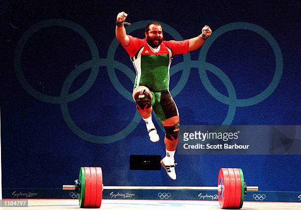 Tibor Stark of Hungary celebrates a successful lift during the mens + 105 kilogram Group B weightlifting event held at the Sydney Convention and...