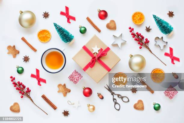 christmas wrapped gift box, art and craft decorative items on white background. - holiday gift stock-fotos und bilder