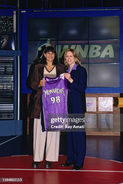 Draft prospect Ticha Penicheiro is drafted second overall by the Sacramento Monarchs poses with WNBA President Val Ackerman during the 1998 WNBA...