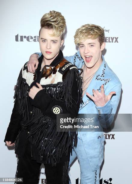 John Grimes and Edward Grimes aka Jedward twins attend the Trick Or treats! Halloween Party held at No Vacancy on October 31, 2019 in Los Angeles,...
