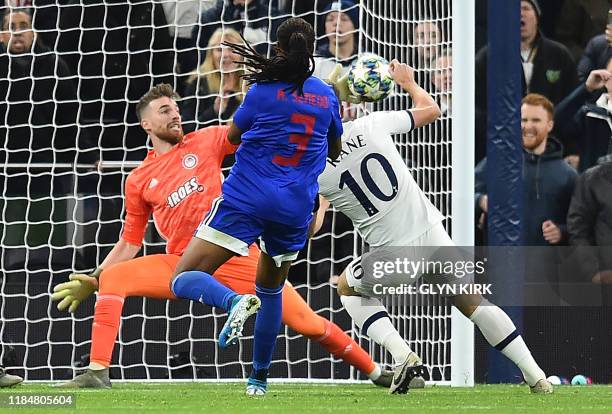 Tottenham Hotspur's English striker Harry Kane scores his team's second goal during the UEFA Champions League Group B football match between...