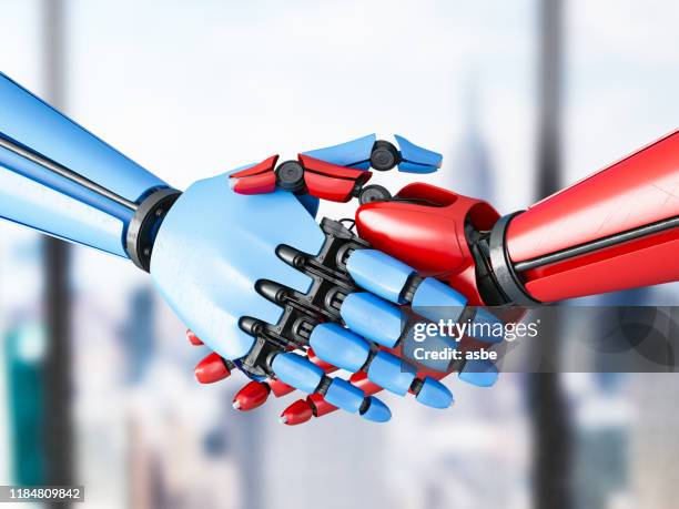 red and blue robot handshake - robot handshake stock pictures, royalty-free photos & images